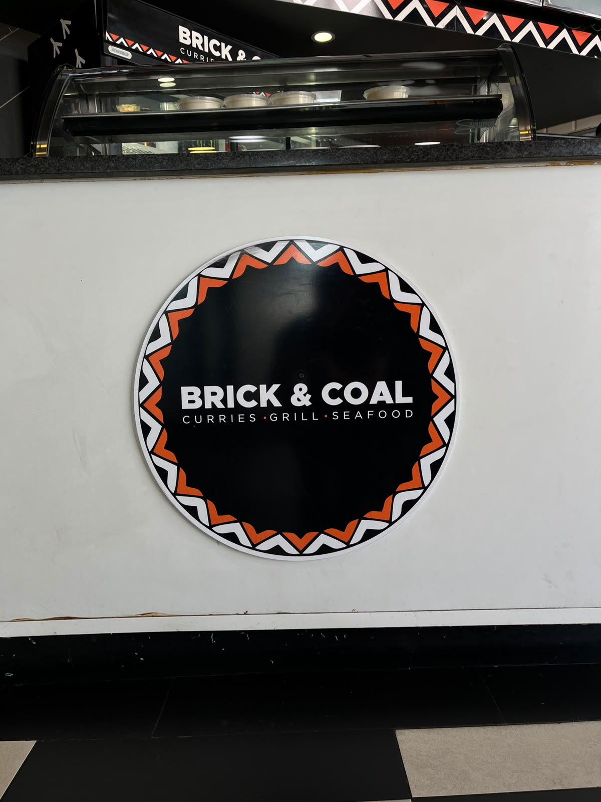 Brick and Coal logo on counter
